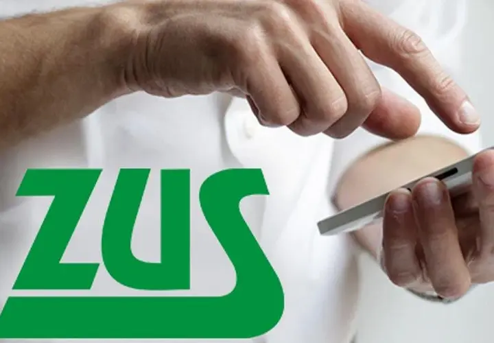 Dłonie obsługują smartfon z logo ZUS. Może to być pomoc w przypadku całkowitej niezdolności do pracy.